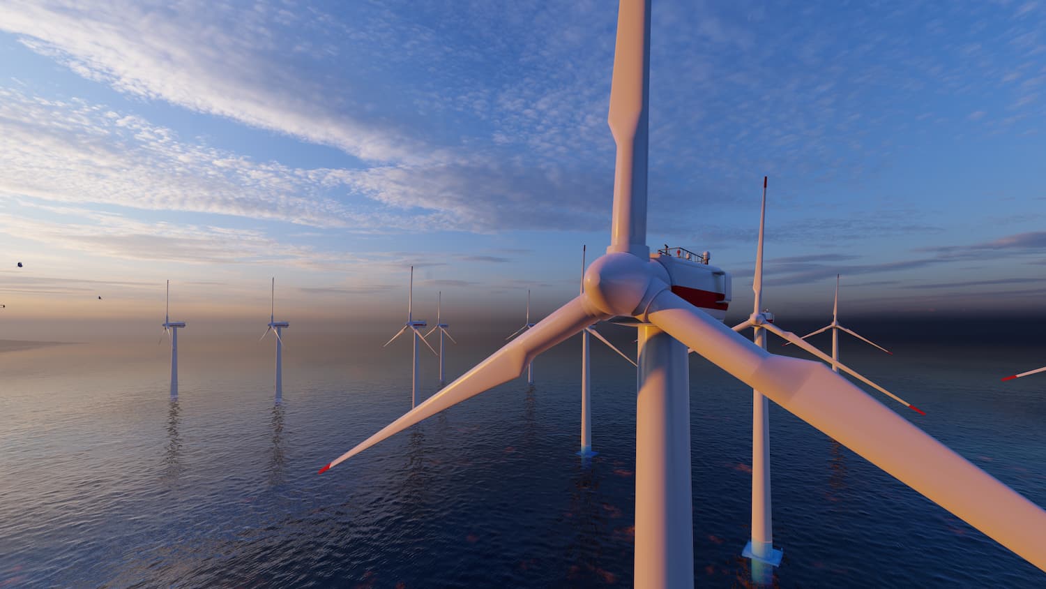 Grupo de aerogeneradores en el océano, representando la tecnología sostenible y la energía renovable en acción.